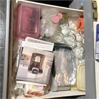 Two drawers of misc kitchen items