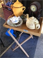 Folding wooden tray table with lot of décor items