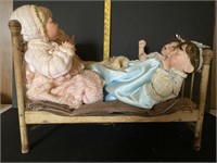 Antique Doll Bed & 4 Dolls