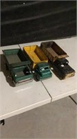 Structo toy metal dump trucks (green) and Lois