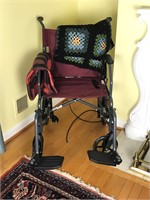 Wheel chair and two blankets