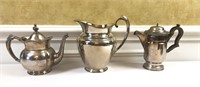 3 Silver plated pitchers