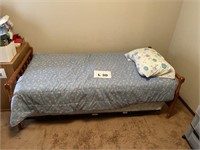 Wooden twin bed (trundle sold separately)