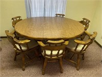 Wooden dining room table with 2 leaves and 6