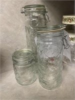 Set of three glass storage canisters