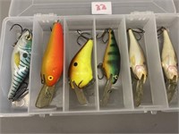 6 harder to find Rapalas in clear case.