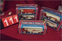 5 TOY TRUCKS IN BOXES