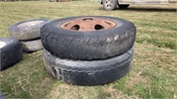 2- 8.25-20 Tires w/ Rims Location 1