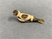 Vintage ivory carving of a seal in King Island sty