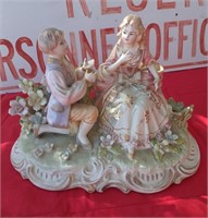 911 - PORCELAIN FIGURINE/CANDLE HOLDER 10"L