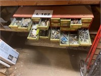 Metal bins with miscellaneous washers, fuses,