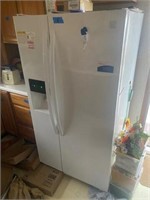 Kenmore Side by Side refrigerator and Freezer.