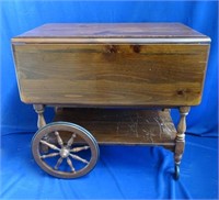 Mahogany drop leaf server on casters