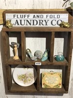 Small rustic display shelf with contents