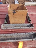 Chicken Feeders with a wooden crate