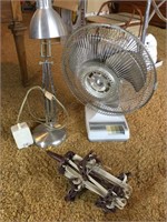 Small oscillating fan, desk lamp and clothes line