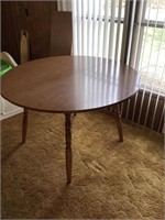 Table with 2 leaves, no chairs, good shape