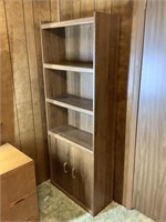 Wall cabinet/book shelf. 71” tall, 28” wide, 1ft