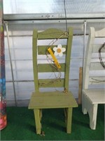 Wooden chair with daisy