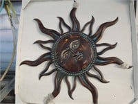 Verdigris sun sign with open rays