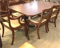 Mahogany table and 6 chairs all the seats good