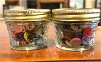 2 small jars of buttons