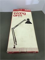Swing arm clamp on light