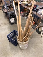 Various wooden dowels and milk crate