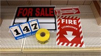 Signs and Roll of Caution Tape