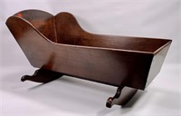 Walnut cradle, tapered sides are dovetailed,