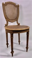 Carved shield back chair, cane seat and back,