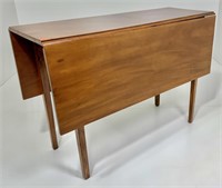 Mahogany drop leaf table, tapered legs have line