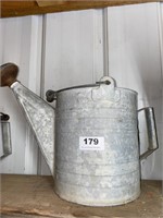 Large galvanized watering can