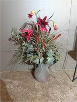 Flower arrangement in rooster pitcher