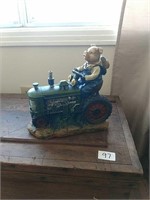 Resin Pig Riding a Tractor