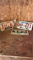 Glass Pepsi bottle and 3 license plates