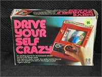 DRIVE YOURSELF CRAZY BY TOMY