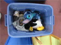 assorted stuffed animals with Rubbermaid tote