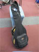 Washburn guitar, carrying case, books