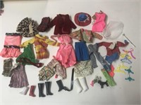 Vintage lot of Barbie doll clothes and