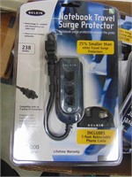 Flat of notebook surge protectors