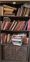 Large bookcase with sliding door on bottom