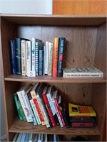 Book shelf with assortment of books