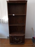 over 6 foot tall book shelf with misc reading.