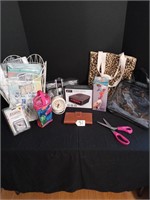 clocks, steam press, misc purses and misc items.
