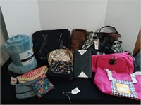 Assortment of purses and blanket