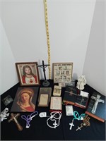 Catholic books, pictures,and rosary assortment
