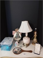 lamps, doll, bracelet, hand mirror and glass eggs.