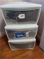 3 storage drawers with gloves and misc