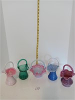Multi color glassware baskets.